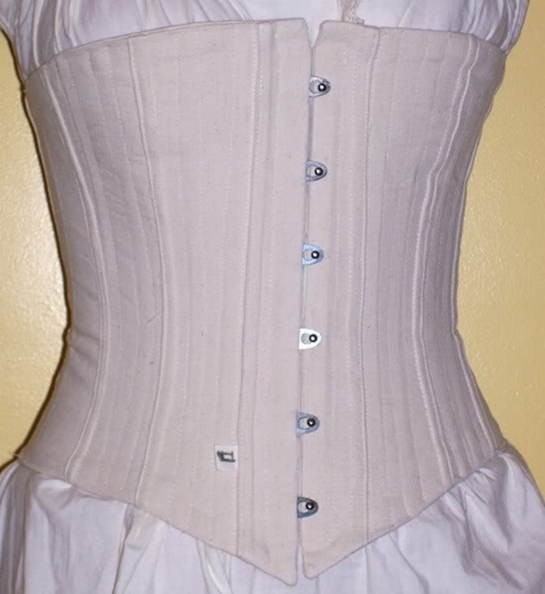 Victorian Corsets – Old Fashioned Corsets & Patterns Civil War Era Corset with Busk and Grommets - Mid Bust - 16 Flat steel bones - Cotton duck cloth -Made to Order $115.00 AT vintagedancer.com