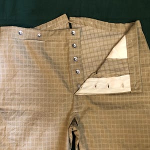 Size 36" Waist Button Fly Trousers  - tan windowpane cotton fabric with tin buttons - two side pockets and a watch pocket; fishtail back