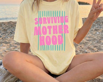 Comfort Colors® Surviving Motherhood Shirt, Trendy Mama Shirt, Tired Moms Club, Funny Mom Shirt, Mothers Day Gifts, Caffeinated Moms Club
