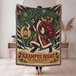 May include: A woven throw blanket featuring a dark green background with a Krampus figure holding a lantern and a red sack filled with toys. The text reads KRAMPUS NIGHT, THE MILLER FAMILY, EST. 2026. The design includes snowy trees and snowflakes.