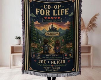 May include: A woven throw blanket featuring a dark blue background with a pixel art fantasy landscape. The text reads CO-OP FOR LIFE, JOE + ALICIA, and 09.03.2025. It depicts two characters walking toward a castle, surrounded by trees and mountains.