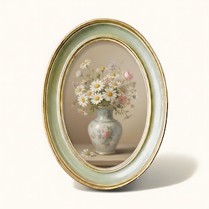 May include: An oval-shaped framed artwork featuring a still life of daisies and other flowers in a decorative vase. The frame has a light green finish with gold trim. The artwork is set against a neutral background.