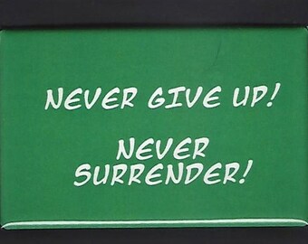 Never give up!   Never surrender!  Pinback button or magnet