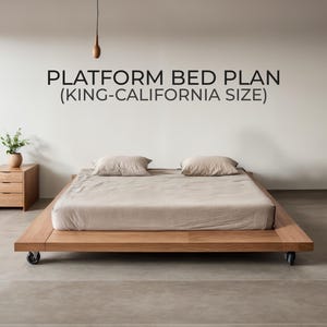 May include: A modern wooden platform bed with a king-size mattress and two pillows. The bed frame is light brown and has a low profile. The text "PLATFORM BED PLAN (KING-CALIFORNIA SIZE)" is on the wall.