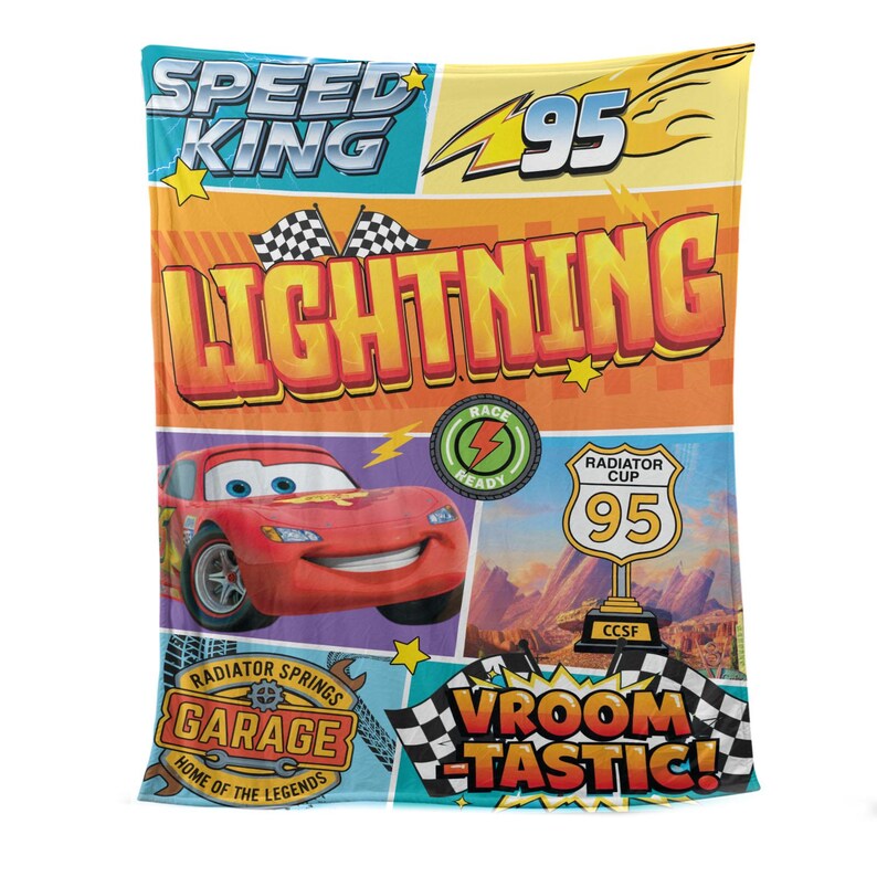May include: A colorful blanket featuring Lightning McQueen from the Cars movie. The blanket has a comic book style design with the words "SPEED KING", "LIGHTNING", and "VROOM-TASTIC!". The number 95 is also prominently displayed.