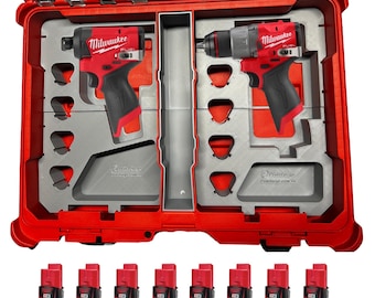 May include: A red and black power tool kit with two drills and several batteries. The drills are labeled "Milwaukee FUEL". The kit is in a red case with a gray interior.