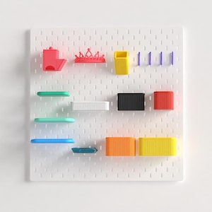May include: A white pegboard with various colorful accessories. Includes red, yellow, black, orange, and blue storage containers, shelves, and hooks. The accessories are designed to be attached to the pegboard.