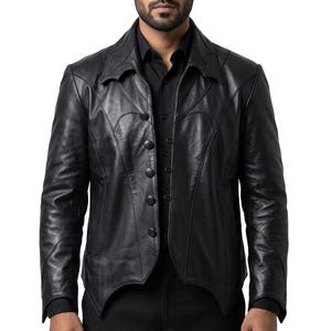 May include: A black leather jacket with a unique design. The jacket features a notched collar, a button-up front, and decorative stitching. The sleeves are long, and the jacket has a tailored fit. The jacket is made of a smooth, shiny leather material.
