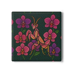 May include: Square decorative tile with a stylized illustration of a praying mantis amidst pink and purple orchids. The background is a dark teal with a swirling pattern. The mantis is pink and yellow.