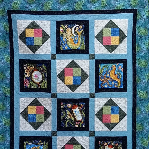 Throw Quilt featuring Luminaria by Julie Paschkis in black, blue, coral, green, and cream, mermaid quilt, one of a kind, Quiltsy Handmade