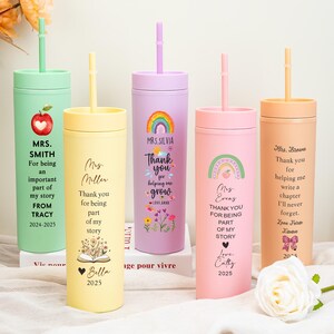 May include: Five personalized tumblers with straws in various colors: green, yellow, purple, pink, and peach. Each tumbler features a teacher's name, a thank you message, and a decorative element like an apple, rainbow, or flowers. The text includes the years 2024-2025.