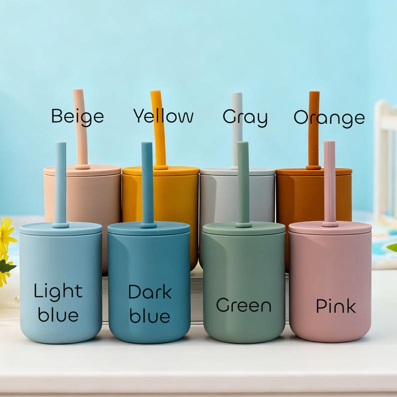 May include: A collection of colorful silicone cups with lids and straws. The cups are in various colors, including light blue, dark blue, green, and pink, with matching lids and straws. The image has text labels: Beige, Yellow, Gray, and Orange.