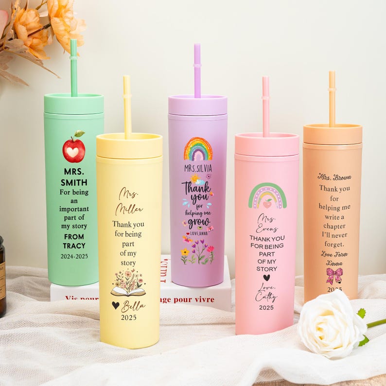 May include: Five personalized tumblers with straws in various colors: green, yellow, purple, pink, and peach. Each tumbler features a teacher's name, a thank you message, and a decorative element like an apple, rainbow, or flowers. The text includes the years 2024-2025.