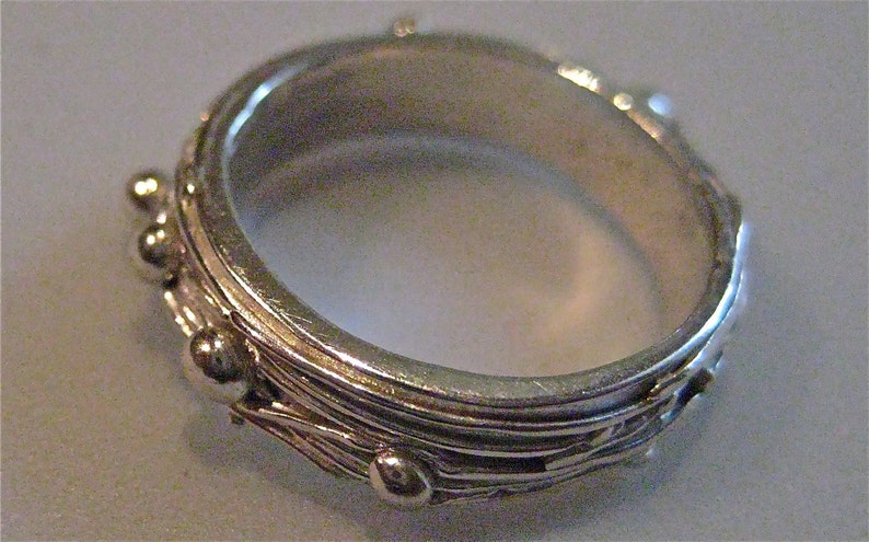 Fine Silver nesting ring with little dots of silver
