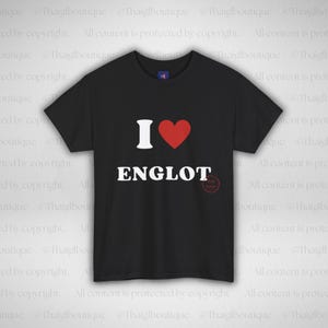 May include: Black t-shirt featuring the text "I ♥ ENGLOT" in white, with a red heart symbol. The shirt has a crew neck design.