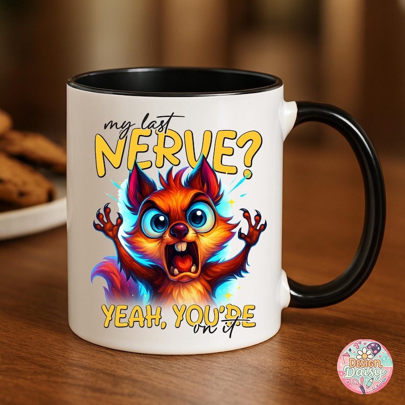 May include: White ceramic mug with a black interior and handle. The mug features a cartoon illustration of a red and orange squirrel with wide blue eyes and an open mouth. Text on the mug reads "my last NERVE? YEAH, YOU'RE on it."