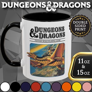 May include: White ceramic mug with a black handle and interior. The mug features the "Dungeons & Dragons" logo and a fantasy illustration of a dragon and rider. The mug is available in 11 oz and 15 oz sizes.