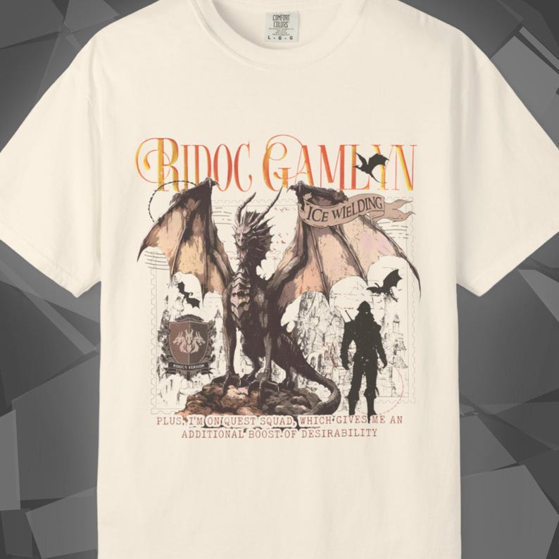 Comfort Colors unisex T-shirt featuring a Fourth Wing fantasy design inspired by the Empyrean Series. Premium quality 100% cotton shirt with a soft, relaxed fit, available in 14 colors and plus sizes. Bookish fantasy apparel inspired by Iron Flame, Onyx Storm, Basgiath War College, Dragon Riders, Fly or Die, and the Riders Quadrant, for fans of Violet Sorrengail, Xaden Riorson, and Rebecca Yarros.