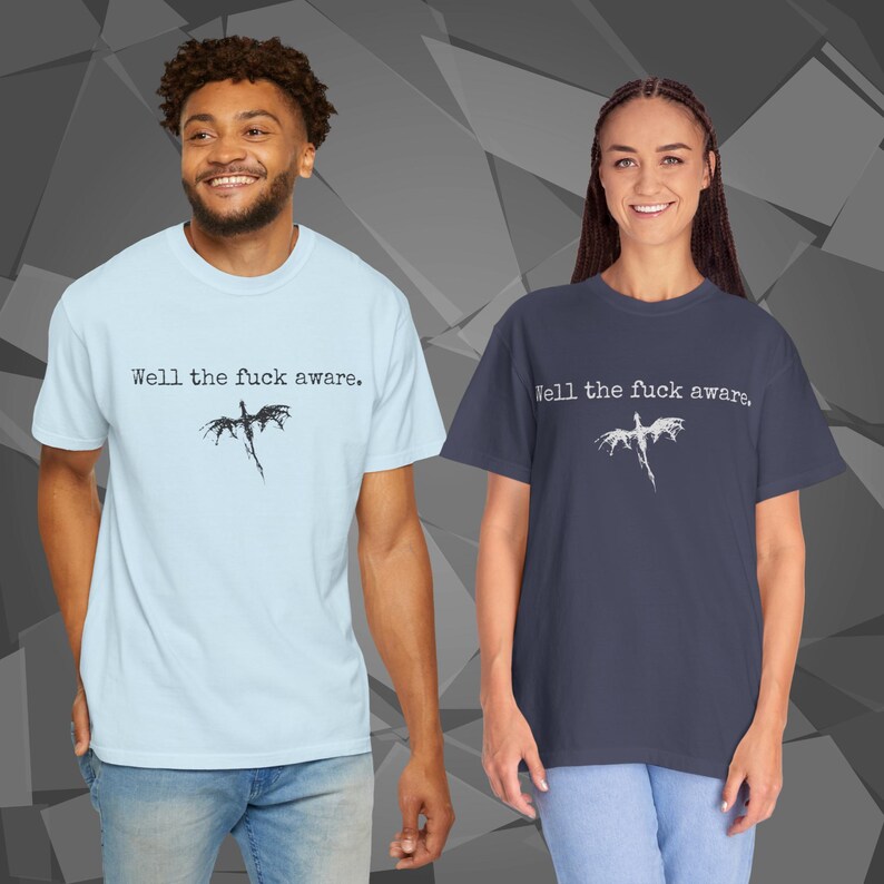 Comfort Colors unisex T-shirt featuring a Fourth Wing fantasy design inspired by the Empyrean Series. Premium quality 100% cotton shirt with a soft, relaxed fit, available in 14 colors and plus sizes. Bookish fantasy apparel inspired by Iron Flame, Onyx Storm, Basgiath War College, Dragon Riders, Fly or Die, and the Riders Quadrant, for fans of Violet Sorrengail, Xaden Riorson, and Rebecca Yarros.
