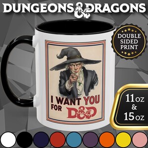 May include: White ceramic mug with a black handle and interior. The mug features a vintage-style illustration of a wizard pointing, with the text "I WANT YOU FOR D&D". The mug is available in 11 oz and 15 oz sizes.