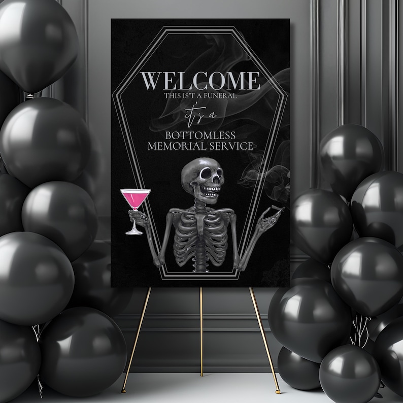 May include: A black sign on a gold easel with the words "WELCOME THIS ISN'T A FUNERAL it's a BOTTOMLESS MEMORIAL SERVICE". The sign features a skeleton holding a pink cocktail and a cloud of smoke.