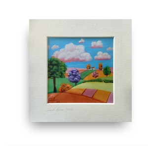 May include: A vibrant landscape painting depicting a rural scene with hills, trees, and a cottage beneath a blue sky with clouds. The artwork is presented in a white mount, offering a clean, classic look.