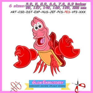 May include: A cartoon crab embroidery design in shades of red, pink, and yellow. The design includes the text "GLOW EMBROIDERY EMBROIDERY MACHINE APPLIQUE DESIGNS". The design is available in 6 sizes: 3.9, 5, 5.9, 6.6, 7.8, 8.9 inches.