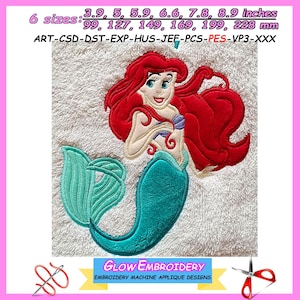 May include: An embroidered applique design of a mermaid with red hair and a teal tail. The design includes the text "GLOW EMBROIDERY" and is available in 6 sizes, ranging from 99mm to 228mm.