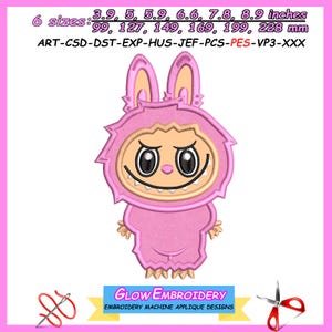 May include: A pink embroidered applique design of a cartoon monster with a smiling face and large eyes. The design includes the text "GLOW EMBROIDERY EMBROIDERY MACHINE APPLIQUE DESIGNS". Available in 6 sizes: 99, 127, 149, 169, 199, 228 mm.