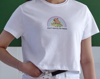 Maglietta con capibara arcobaleno "non preoccuparti, sii un capibara"