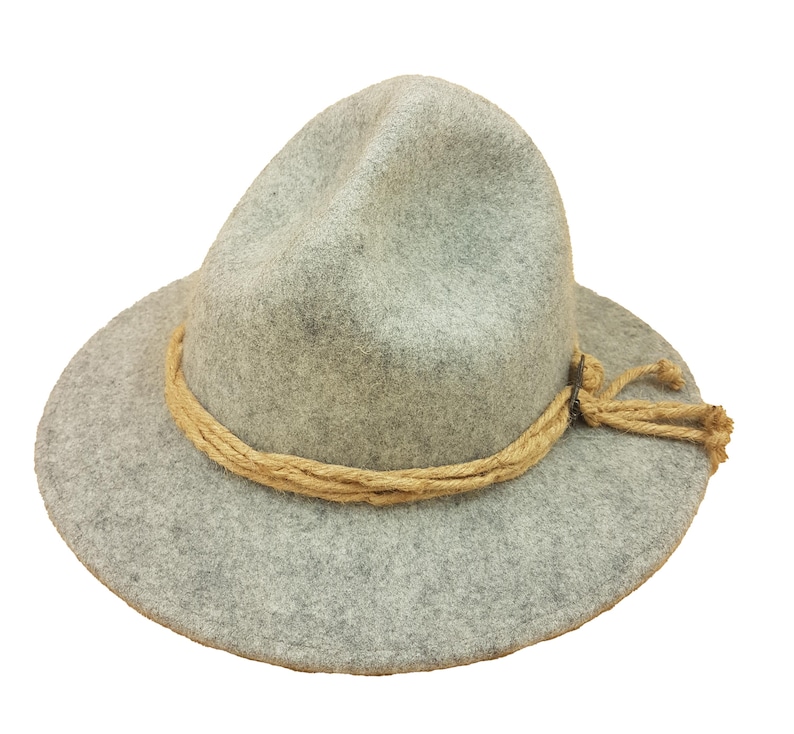 May include: A gray fedora-style hat with a wide brim and a light brown rope band. The hat has a slightly distressed look, with a soft, felt-like texture. The rope band is tied on the side.