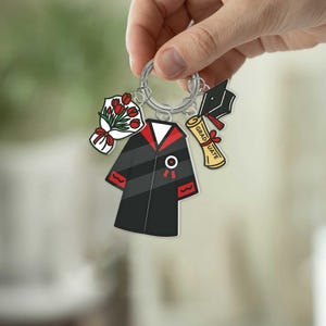 Llavero de graduación, regalo / Llavero con dije de toga y birrete de la clase de 2025 con diploma y flores / Recuerdo de fiesta de graduación para él o ella