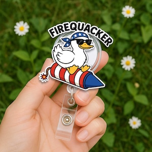 Bobine d'insigne Quacker Duck - Clip d'identification amusant du 4 juillet - Porte-badge infirmière patriotique - Accessoire de travail Rocket Duck