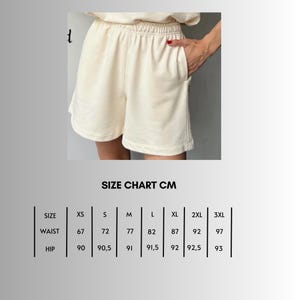 May include: Size chart for shorts in cream color. The chart shows sizes XS to 3XL with measurements in centimeters for waist and hip.