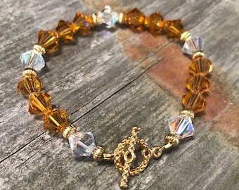 Brown and Clear Swarovski bracelet with gold toggle