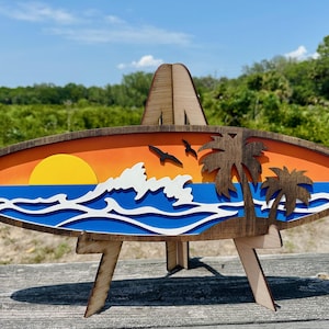 Wooden Surfboard Wall Art – Tropical Beach Decor with Sunset, Waves & Palm Trees - 23"