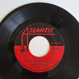7-inch 45 RPM Vinyl Record &quot;Pledging My Love&quot; &quot;The Clock&quot;. By Aretha Franklin