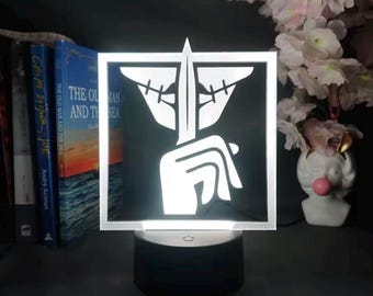 Lámpara de noche LED Caveira: Base táctil multicolor, alimentada por USB.