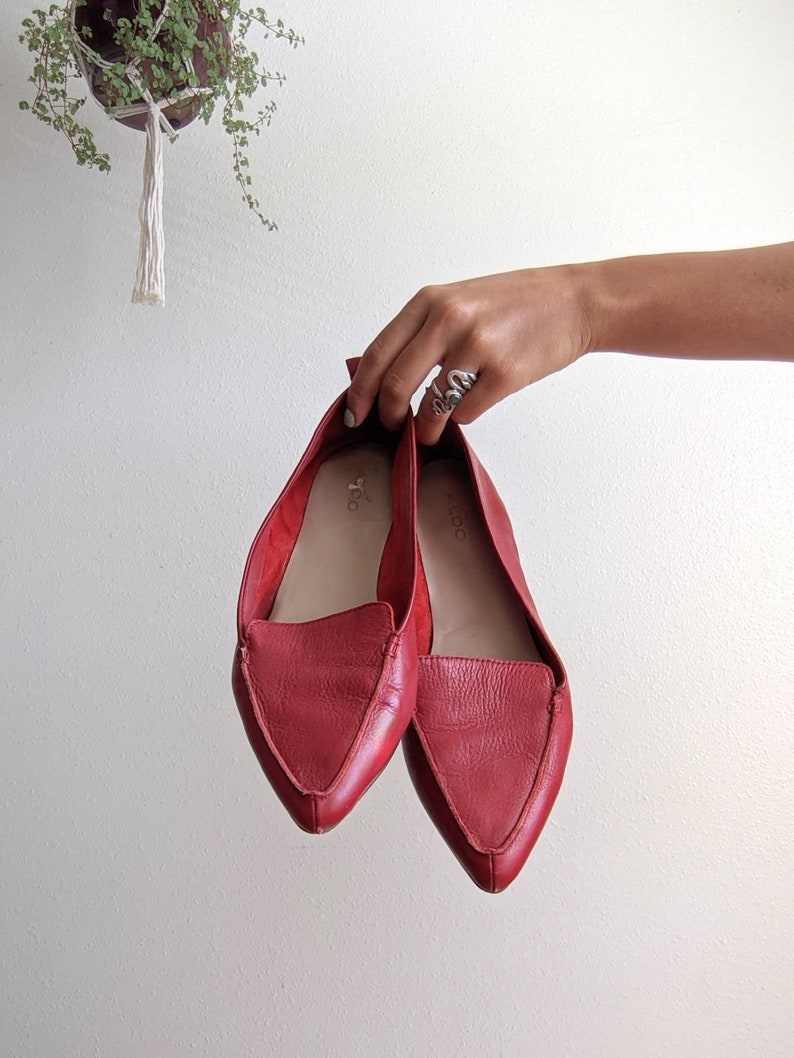red leather pointed toe flats