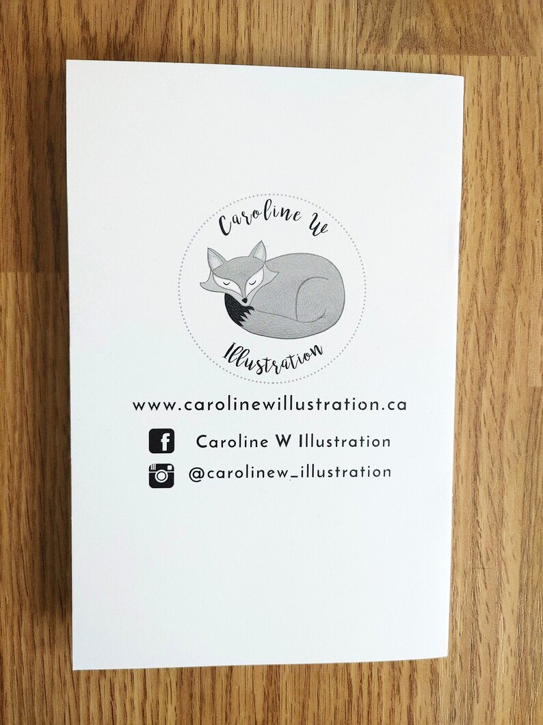 May include: A white card with a black and white illustration of a sleeping fox in a circle with the text "Caroline Wu Illustration" and the website address "www.carolinewillustration.ca". Social media icons for Facebook and Instagram are included with the text "Caroline W Illustration" and "@carolinew_illustration".