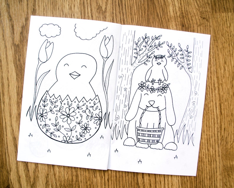 May include: A black and white coloring page featuring a chick hatching from an egg decorated with flowers and a bunny wearing a flower crown and holding a basket.