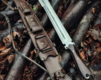 May include: A brown leather sheath with a silver blade knife. The sheath has multiple pockets and straps. The knife has a wooden handle.