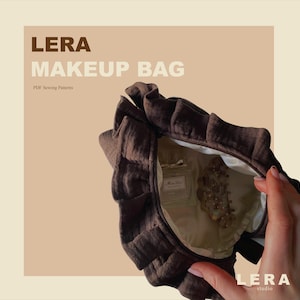 May include: A brown makeup bag with a ruffled edge, open to show a perfume bottle and hair clip. The bag has a zip closure and is labelled "LERA MAKEUP BAG" with "PDF Sewing Patterns" below.