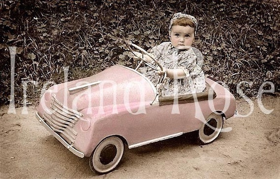vintage pink pedal car