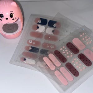 Peel-and-stick nail color with uv light kit