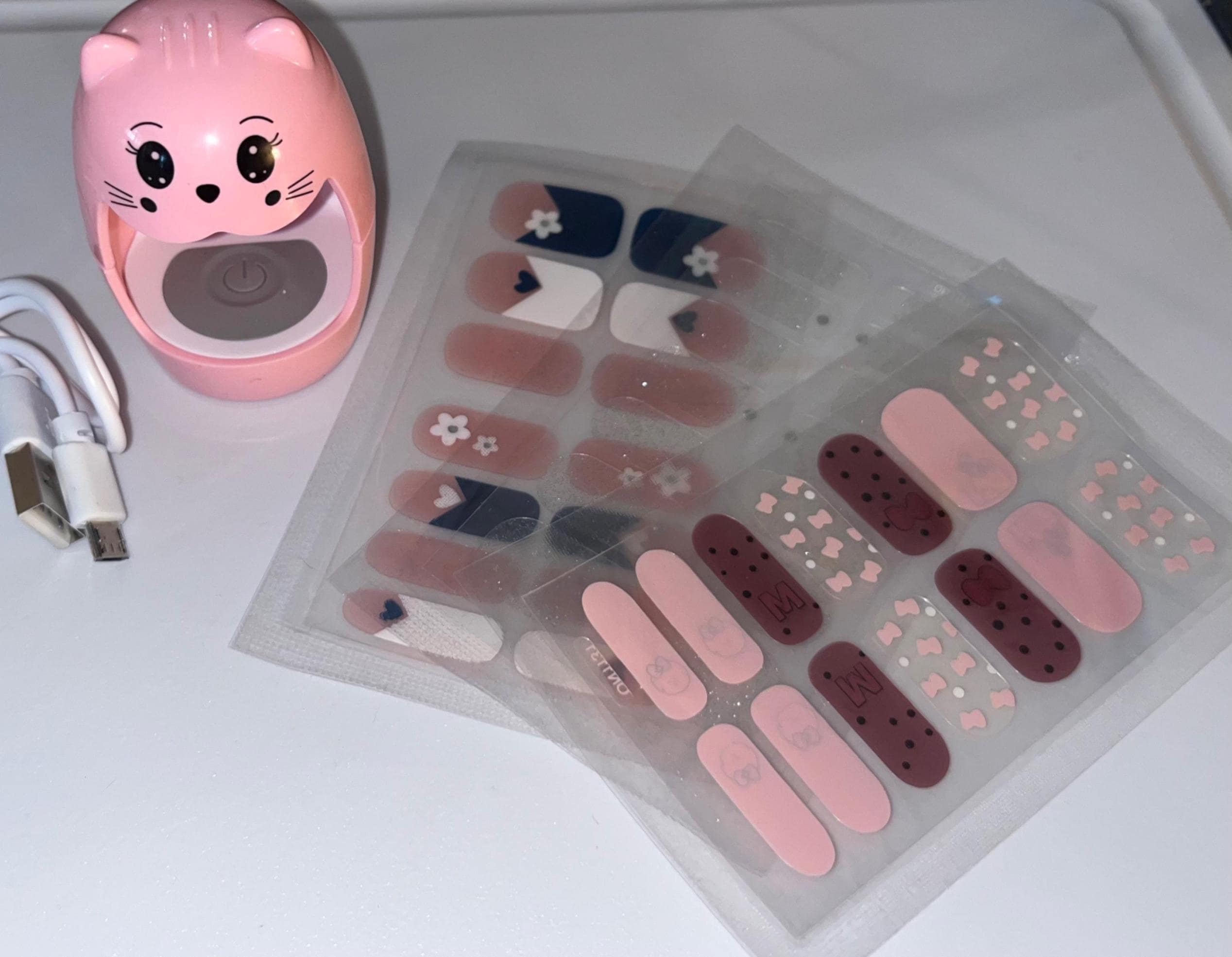 Peel-and-stick nail color with uv light kit