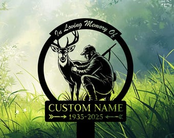 May include: Black metal garden stake featuring a deer and a kneeling hunter within a circular frame. The text "In Loving Memory Of" arches above the scene. Below, a rectangular plaque reads "CUSTOM NAME" and "1935-2025".
