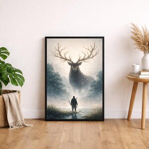 May include: Framed art print depicting a mystical scene. A towering stag with large antlers and glowing eyes dominates the misty background. A lone figure stands in a stream, facing the stag. The artwork is framed in black.