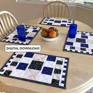May include: Three blue and white quilted placemats with a constellation pattern on a wooden table. The placemats have a black and white polka dot border.  DIGITAL DOWNLOAD
