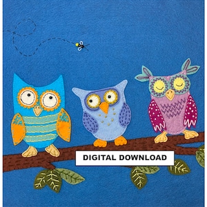 May include: Three felt owls perched on a brown branch with green leaves. The owls are blue, purple, and light blue with orange beaks and yellow eyes. The background is a solid blue. The text "DIGITAL DOWNLOAD" is at the bottom of the image.
